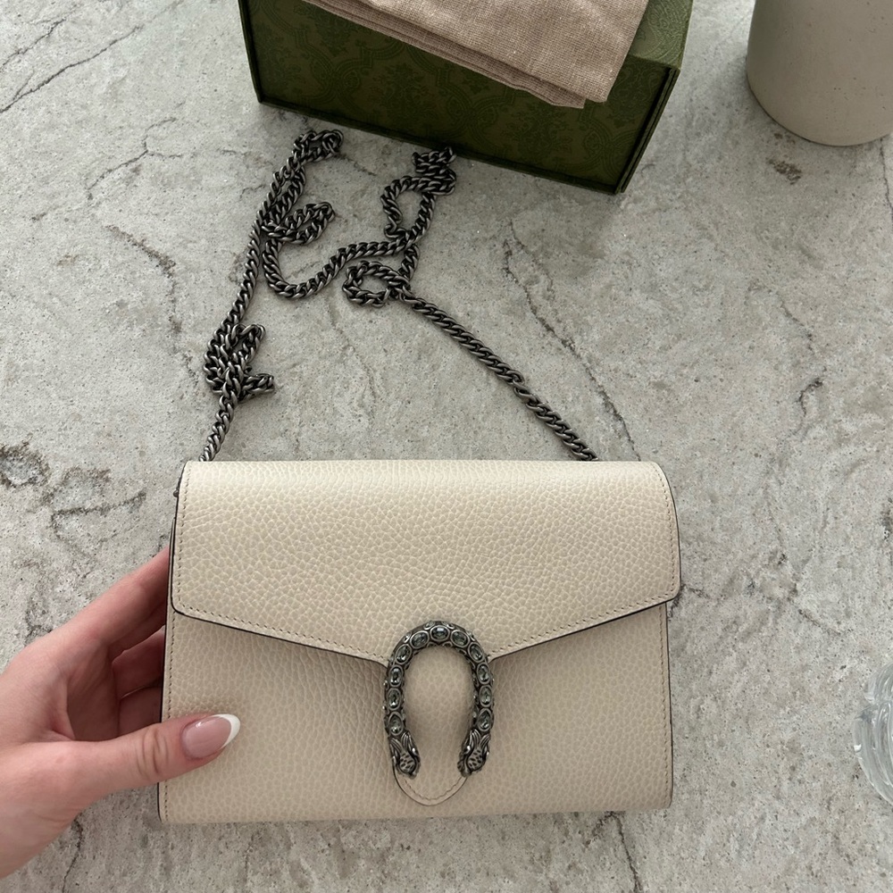Brand new Gucci chain wallet. Comes with box, dust bag, & receipt if wanted.